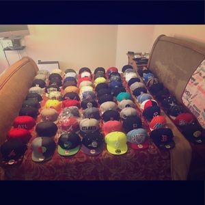 A Collection of 81 Unique Ball Caps Fitted & Snaps